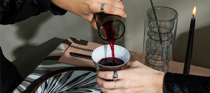 romantic dinner table at home with wine and candle